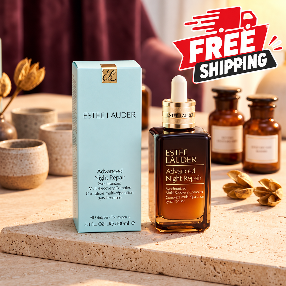 Estée Lauder Advanced Night Repair serum shown with its light blue box and amber dropper bottle on a stone surface, with Estée Lauder bottles and a 'FREE SHIPPING' graphic in the background.